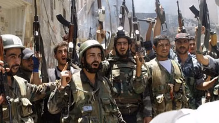 Quân đội Syria tái chiếm vị trí then chốt ở ngoại ô Damascus ảnh 1