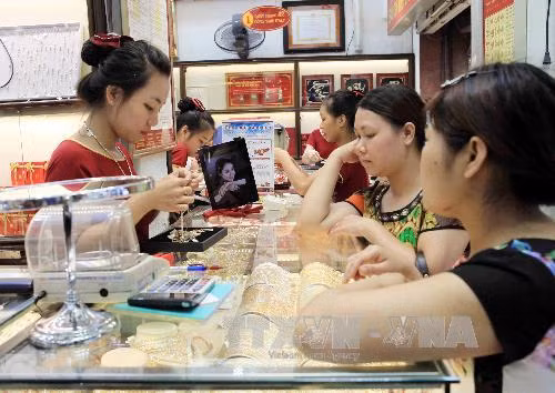 Sau Tết, vàng giảm giá mạnh ảnh 1