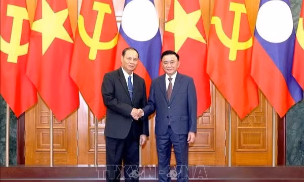 Thường trực Ban Bí thư chủ trì Lễ đón chính thức Thường trực Ban Bí thư Trung ương Đảng NDCM Lào