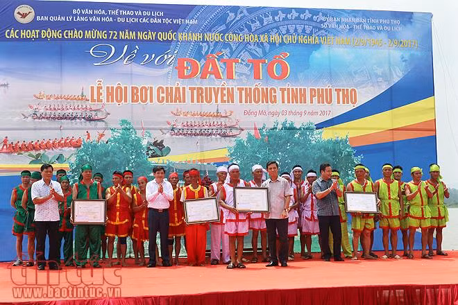 Tái hiện lễ hội bơi chải truyền thống ảnh 11