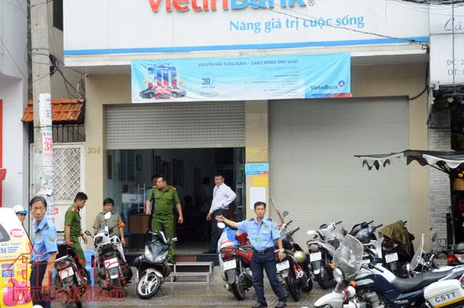 Bắt giữ nghi can cướp ngân hàng VietinBank ở TP Hồ Chí Minh ảnh 5