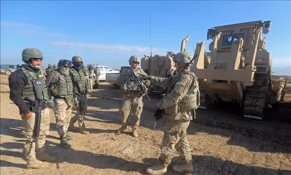 Binh sĩ Mỹ làm nhiệm vụ tại căn cứ quân sự Basmaya, đông nam thủ đô Baghdad của Iraq. Ảnh tư liệu: AFP/TTXVN (Không được phép chia sẻ, sử dụng bởi bên thứ ba)
