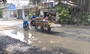 Bến Tre: Cần sửa chữa khẩn cấp tình trạng bong tróc, 'ổ gà' trên quốc lộ 57, đảm bảo ATGT