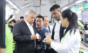 Lấy người lao động là trung tâm của sự phát triển