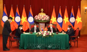 Tổng Bí thư Nguyễn Phú Trọng và Tổng Bí thư, Chủ tịch nước Lào chứng kiến Lễ ký kết văn kiện hợp tác giữa Việt Nam-Lào