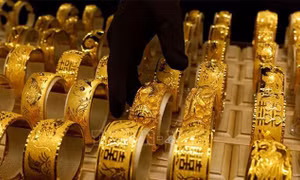 Giá vàng châu Á giảm do đồng USD tăng