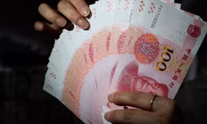 Thực hư việc Trung Quốc in ngoại tệ quy mô lớn