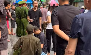 Hà Nội: Điều tra vụ Công an phường bị lái xe ô tô hất văng lên nắp capo