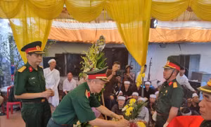 Bàn giao hài cốt liệt sĩ và tổ chức lễ truy điệu, an táng về quê hương