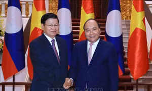 WEF ASEAN 2018: Thủ tướng Nguyễn Xuân Phúc tiếp Thủ tướng Lào