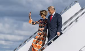 Người ủng hộ chào đón ông Trump trở về Florida sau khi rời Nhà Trắng