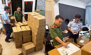 Lực lượng Quản lý thị trường và đơn vị phối hợp tiến hành kiểm đếm, niêm phong hàng hóa vi phạm.