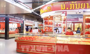 Lào thành lập thị trường ngoại hối tập trung để kiểm soát việc trao đổi, mua - bán ngoại tệ
