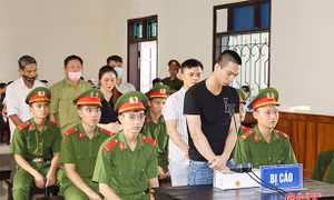 Tuyên án 7 bị cáo trong đường dây đưa người sang Anh trái phép