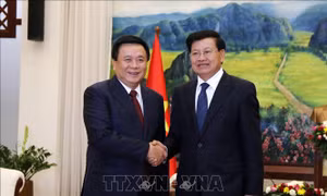 Tăng cường trao đổi thông tin, nghiên cứu về lý luận và thực tiễn giữa Việt Nam và Lào