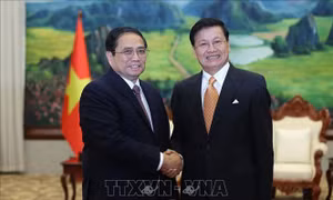 Thủ tướng Phạm Minh Chính gặp Tổng Bí thư, Chủ tịch nước Lào Thongloun Sisoulith 
