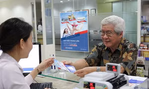 Khơi dòng vốn, tăng sức bền ngân hàng - Bài 2: Tiền gửi tăng, chất lượng tài sản chịu sức ép