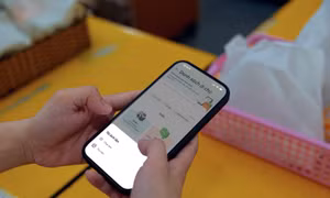 Grab tích hợp AI, mở rộng dịch vụ gia đình