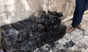 Iraq phát hiện hàng trăm bọc tiền do nhóm khủng bố IS cất giấu 
