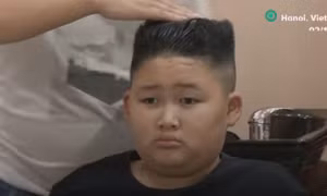 Thợ tóc Việt miễn phí cắt tóc giống ông Kim Jong-un, Donald Trump lên báo quốc tế