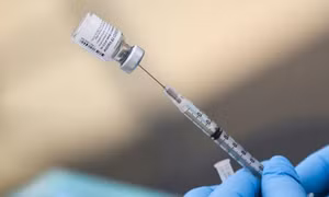 Người dân Mỹ có thể phải trả tiền để tiêm vaccine COVID-19 từ năm sau