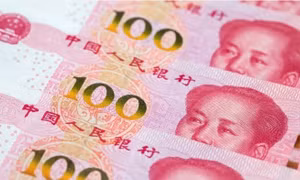 Nhân dân tệ mất giá kỉ lục so với đồng USD