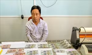 Bắt tạm giam hai bị can sản xuất, tàng trữ tiền giả