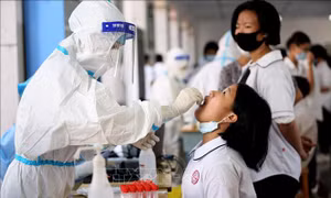 Xét nghiệm đại trà - Giải pháp dập dịch thần tốc của Trung Quốc