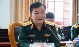 Việt Nam và Lào trao đổi chính sách quốc phòng