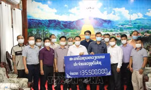 Cộng đồng người Việt ở Bắc Lào chung tay hỗ trợ chính quyền khống chế dịch