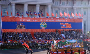 Kỷ niệm trọng thể 50 năm Quốc khánh nước Cộng hòa Dân chủ Nhân dân Lào