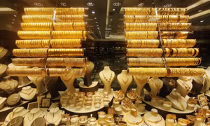 Giá vàng thế giới tăng trong phiên 20/12 do đồng USD yếu