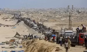 Dòng người Palestine khăn gói trở về quê nhà tan hoang ở Thành phố Gaza