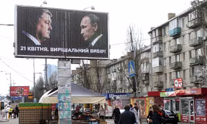 Điện Kremlin phản ứng trước hình ảnh Tổng thống Putin in trên áp phích bầu cử Ukraine