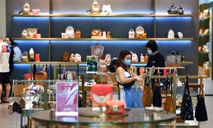 Các nhãn hàng xa xỉ kiếm bộn tiền trong lạm phát và suy thoái