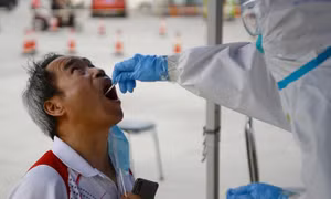 Ca lây bệnh không triệu chứng, âm tính với COVID-19 bí ẩn tại Trung Quốc