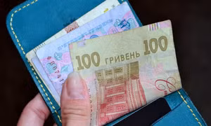 Bloomberg: IMF đề xuất buộc Ukraine phá giá đồng tiền