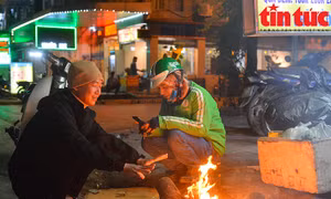 Đốt lửa sưởi ấm trên vỉa hè có vi phạm pháp luật?