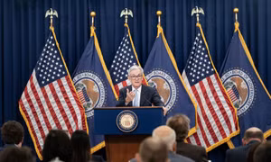 Cú hích thúc đẩy Fed ‘quay xe’
