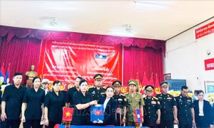 Bàn giao và tiễn đưa hài cốt liệt sĩ quân tình nguyện và chuyên gia Việt Nam hy sinh tại Nam Lào về nước
