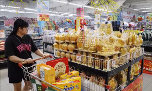 Hóa giải áp lực lạm phát khi tăng lương