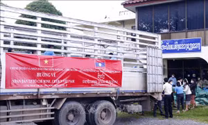 Tỉnh Xiengkhouang của Lào chia sẻ khó khăn với nhân dân TP Hồ Chí Minh