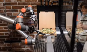 Độc đáo cửa hàng pizza chỉ toàn robot phục vụ