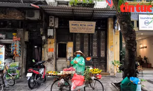 Vất vả mưu sinh nơi phố phường ngày mưa rét
