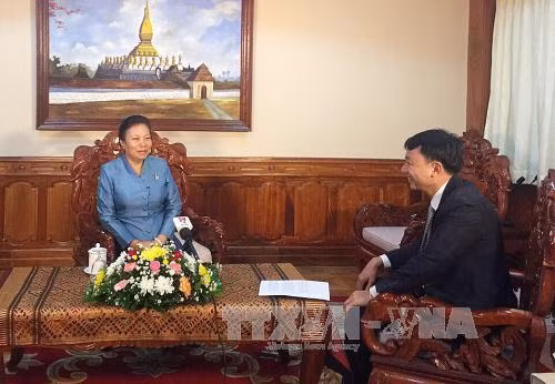 Chuyến thăm Lào của Tổng Bí thư sẽ giúp nâng quan hệ hai nước lên tầm cao mới ảnh 1
