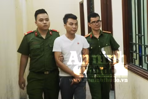 Tạm giữ hình sự lái xe tải đâm cảnh sát giao thông bất tỉnh ảnh 1