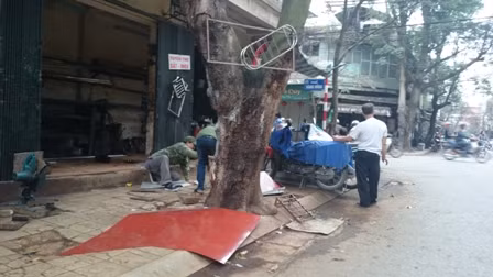 Loạn lấn chiếm vỉa hè tại Hà Nội ảnh 8