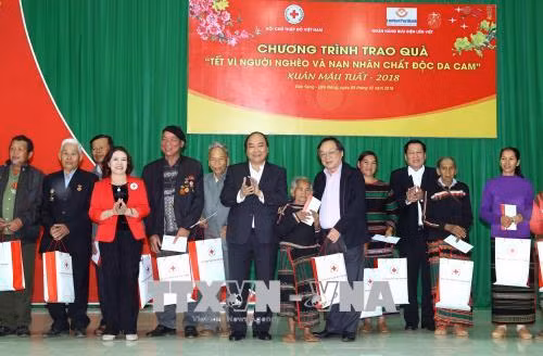 Thủ tướng Nguyễn Xuân Phúc: Không để bà con bị đói cơm, lạt muối trong những ngày Tết ảnh 2