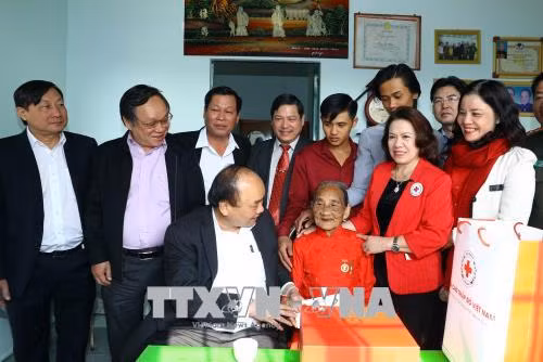 Thủ tướng Nguyễn Xuân Phúc: Không để bà con bị đói cơm, lạt muối trong những ngày Tết ảnh 3