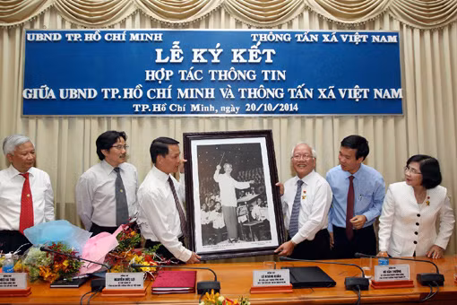 TP Hồ Chí Minh và TTXVN đẩy mạnh hợp tác thông tin ảnh 1